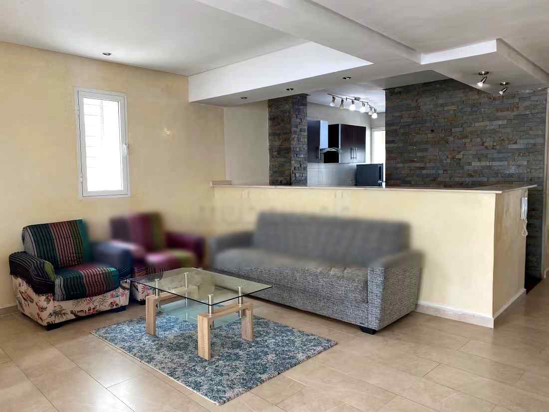 Location saisonnière à Agdal. 
Superficie 170 m². 
Salon traditionnel et système d'antenne parabolique - Photo 11