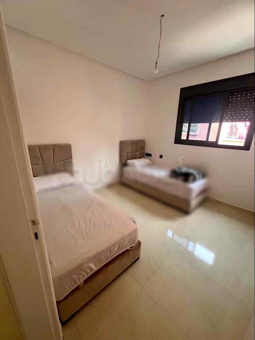 Appartements à louer à Beni Mellal. La superficie totale est de 90 m². Salon marocain et service de sécurité. - Photo 2