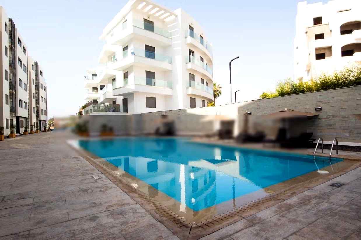 Appartement à louer courte durée à Agadir bay secteur touristique 
deux chambre salon cuisine équipée superficie 75 mètres carrés piscine à 300 mètres de la plage - Photo 4