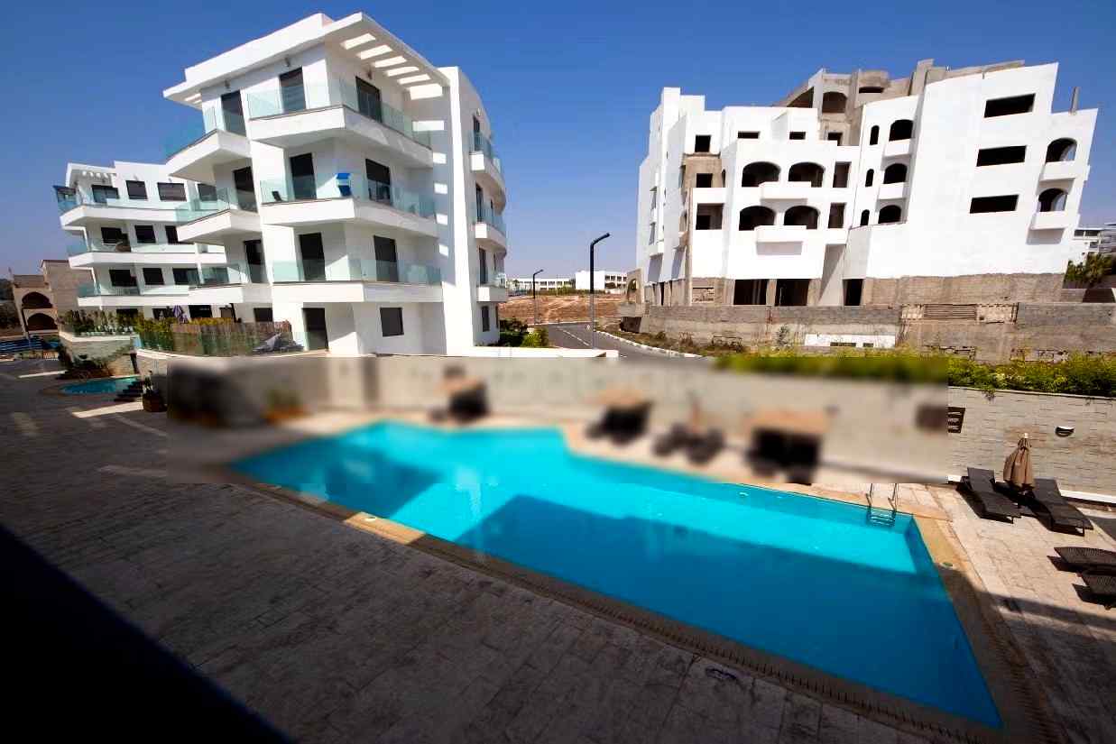 Appartement à louer courte durée à Agadir bay secteur touristique 
deux chambre salon cuisine équipée superficie 75 mètres carrés piscine à 300 mètres de la plage - Photo 2