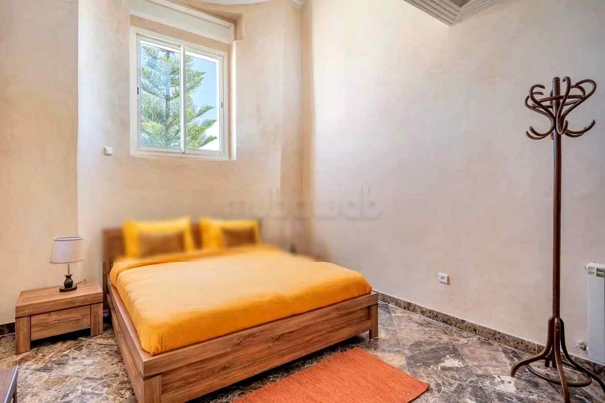 Villa de standing à louer pour vos vacances à Jbel Kbir. Superficie 1000 m². Jardin et terrasse - Photo 9