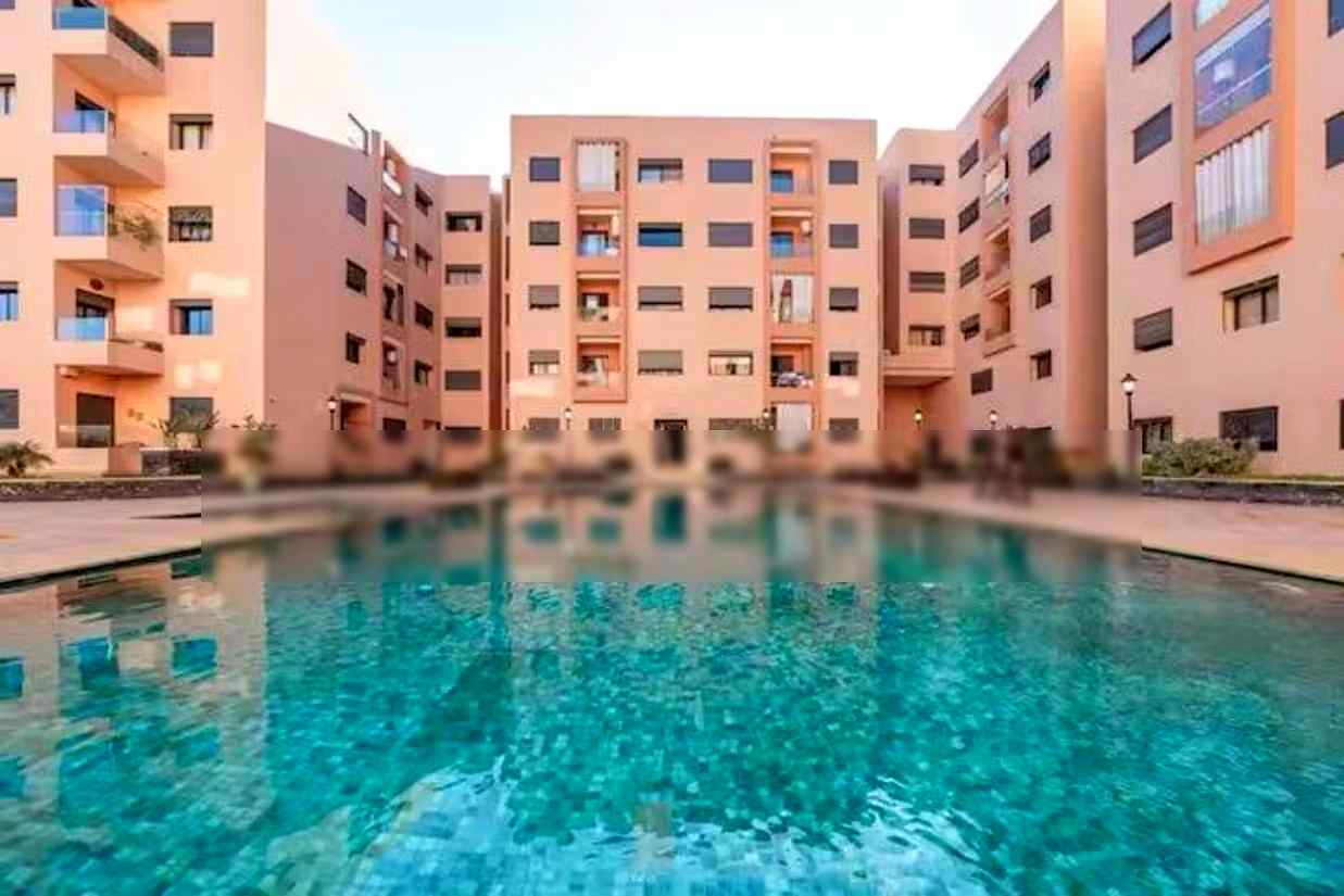 Bel appartement meublé avec 2 piscines a Marrakech - Photo 11