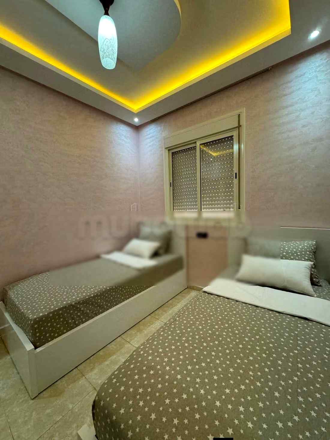 Location d'un appartement à Bouchouaf. 
2 belles chambres. 
Porte blindée, salon marocain traditionnel - Photo 8